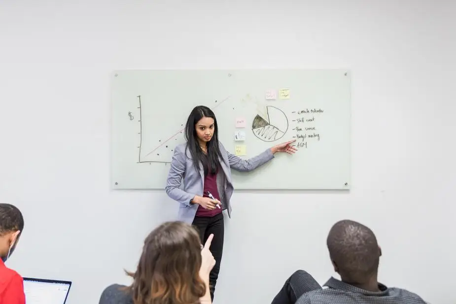 woman presenting pie chart.jpg