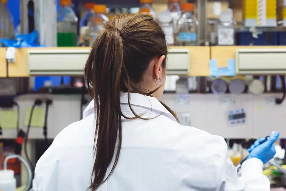woman scientist doing experiment.jpg